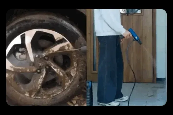 泥だらけの車のホイールを高圧洗浄機で清掃