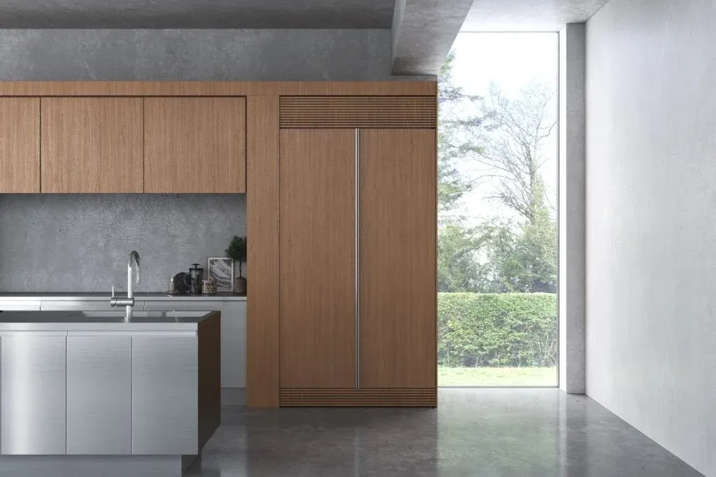 木製キャビネットとステンレス製のアイランドが特徴的なモダンでミニマリストなキッチン