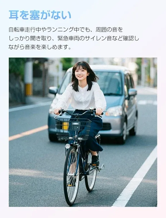 自転車に乗る若い女性